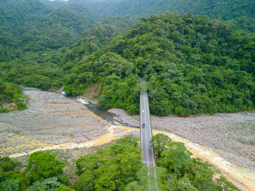 Aerial view of Route 32 (Zurqui) in Costa Rica with Sucio and Hondura rivers surrounded by forests